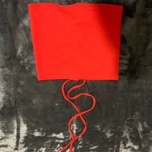Strapless, red  tube top with a strap in the back
